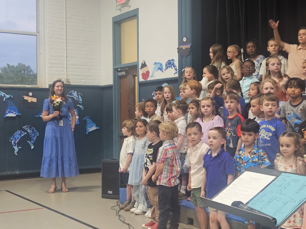 Teacher with flowers for a job well done