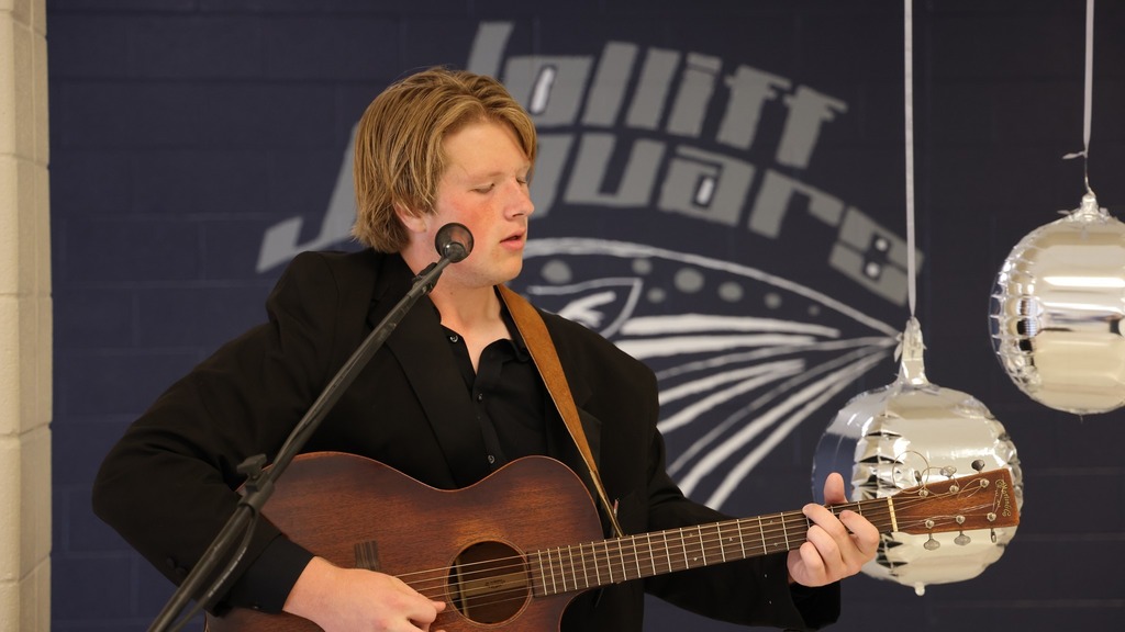 Former student plays music at JMS 25 year celebration