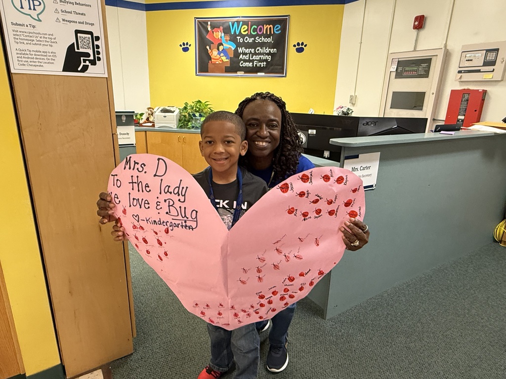 kindergarten students with heart signs appreciating the secretaries
