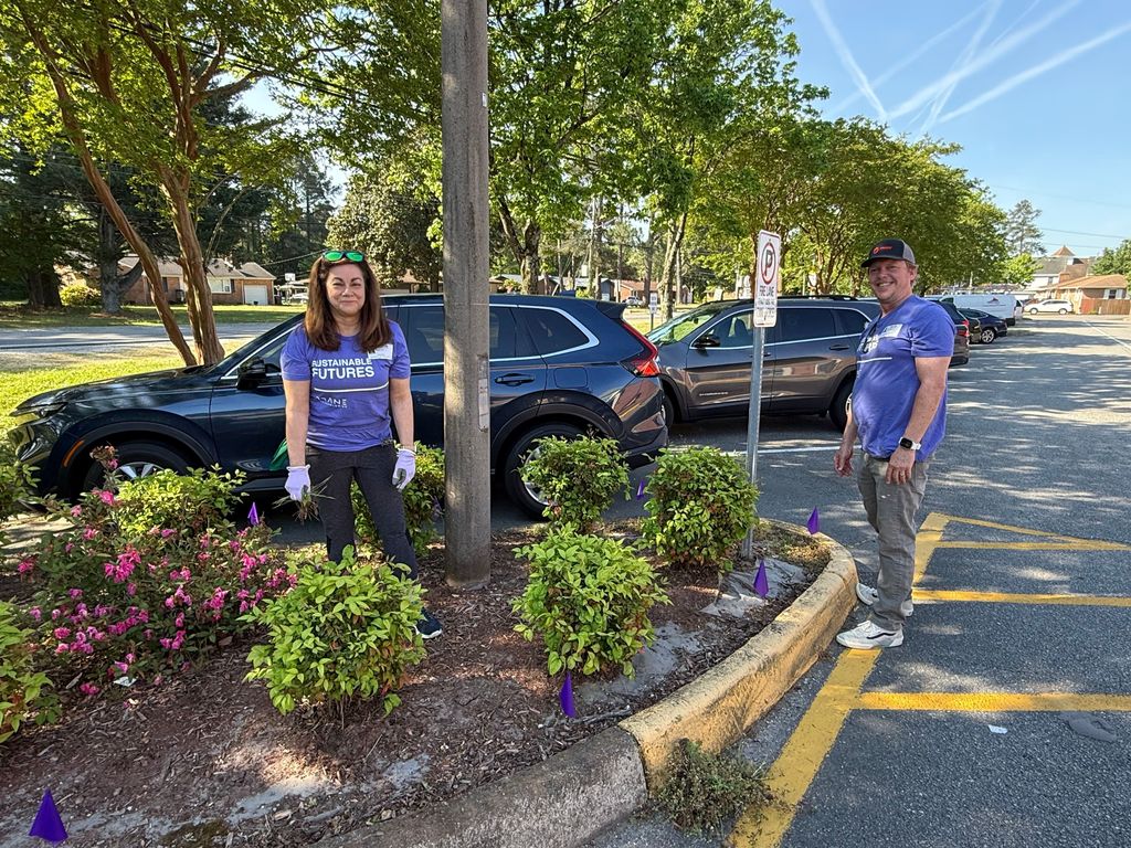 volunteers gardening at swe