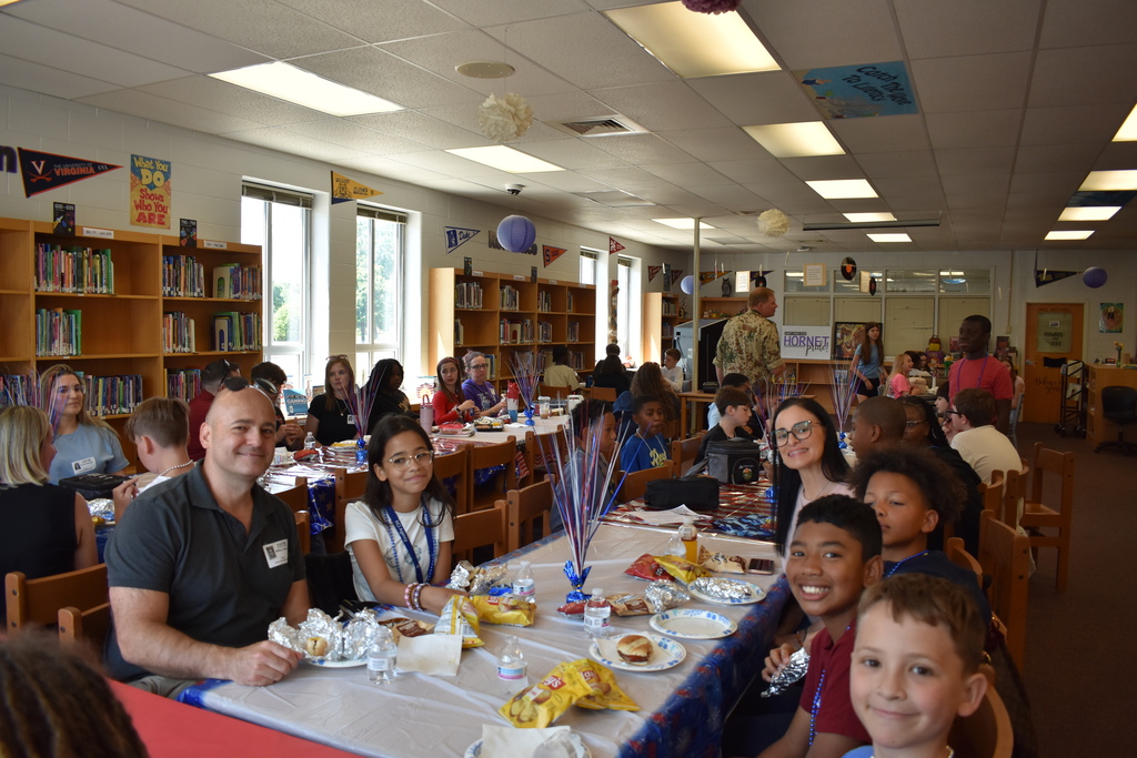 a group of parents and students enjoying the military luncheon