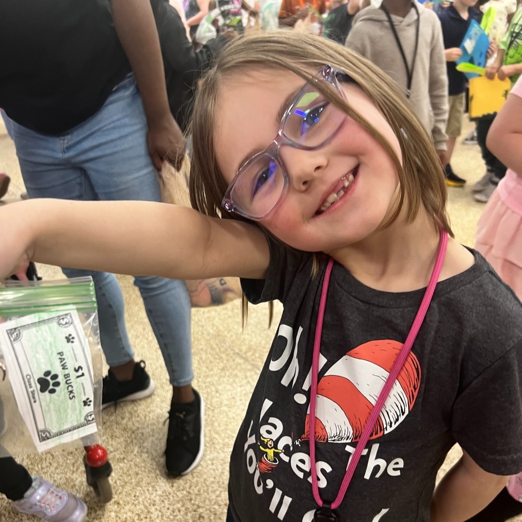 1st grade student at the school store