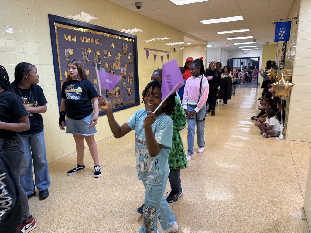 students walking in the MOMC parade
