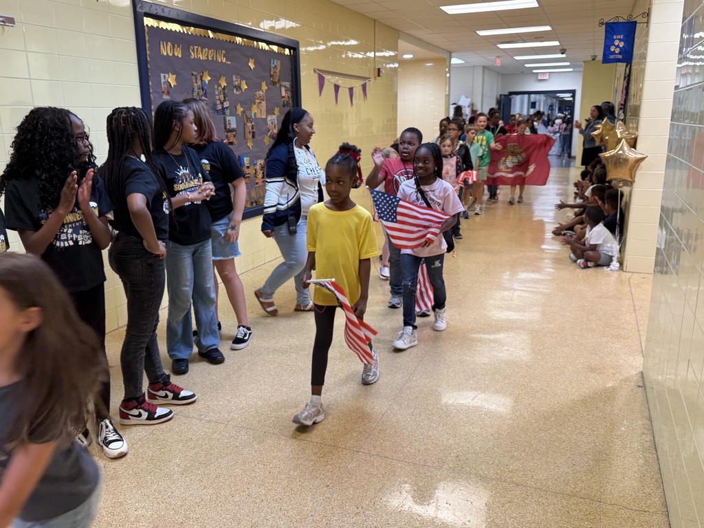 students walking in the MOMC parade