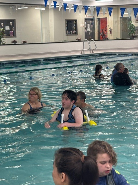 students swimming at a local YMCA 