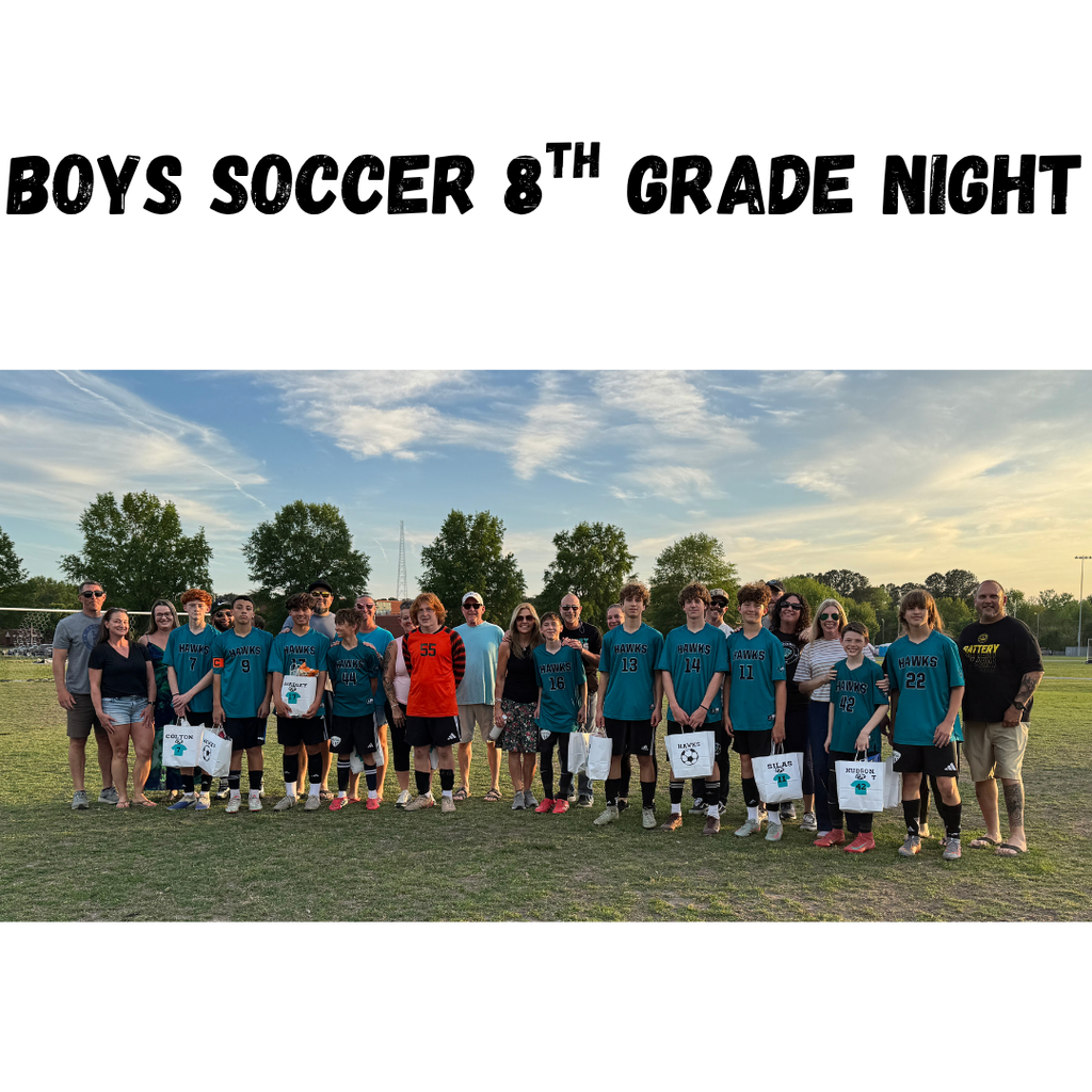 Our 8th grade Boys Soccer players and parents stand for a picture before their game