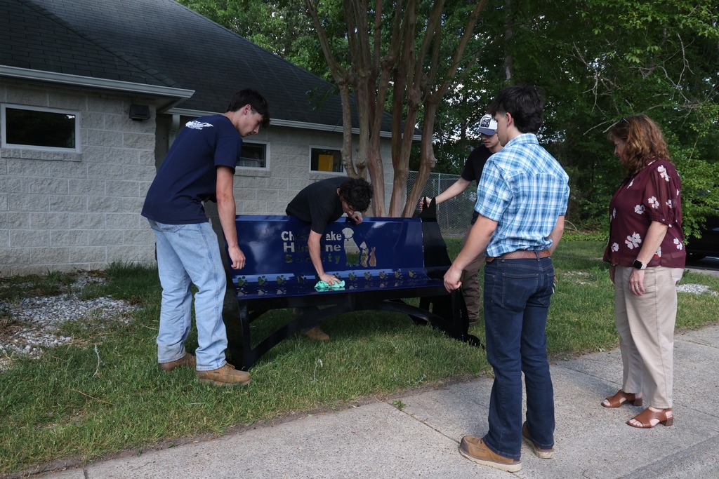 CCC students deliver benches to the Chesapeake Humane Society and everyone gathers to celebrate