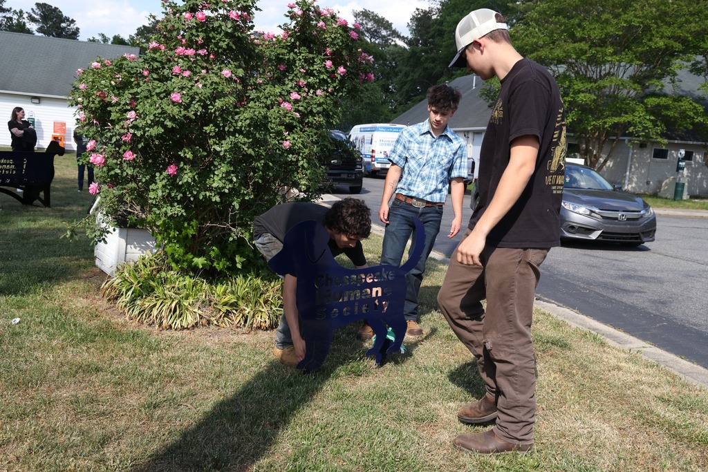 CCC students deliver benches to the Chesapeake Humane Society and everyone gathers to celebrate