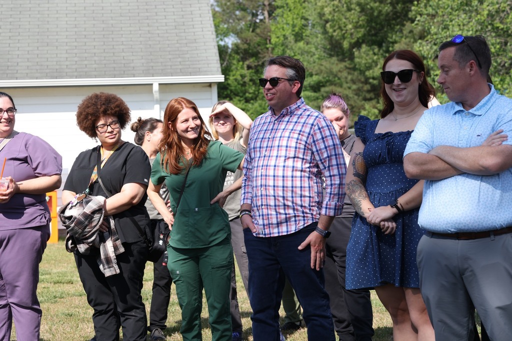 CCC students deliver benches to the Chesapeake Humane Society and everyone gathers to celebrate