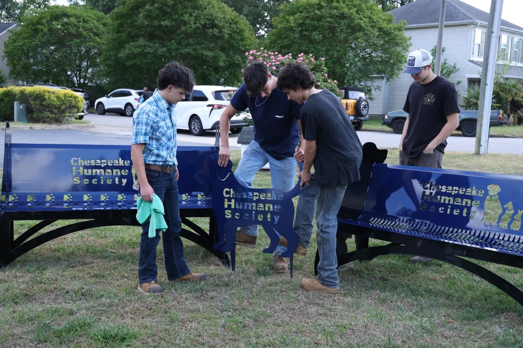 CCC students deliver benches to the Chesapeake Humane Society and everyone gathers to celebrate