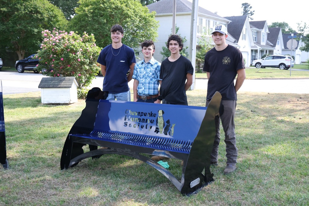 CCC students deliver benches to the Chesapeake Humane Society and everyone gathers to celebrate