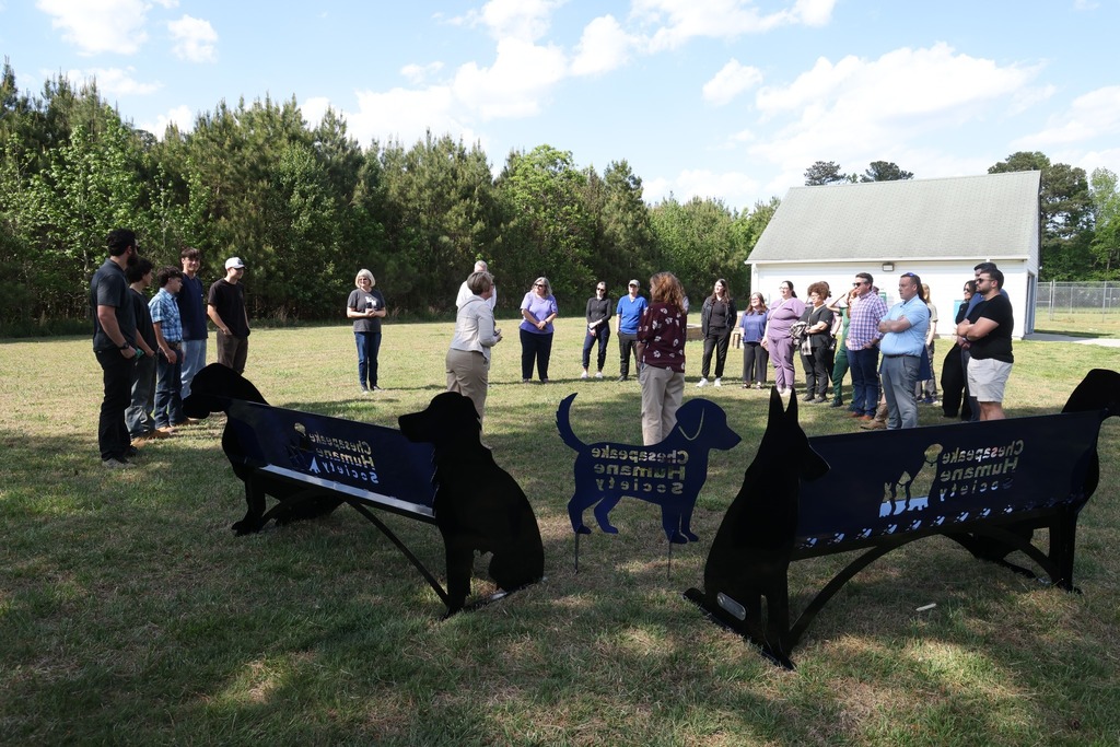 CCC students deliver benches to the Chesapeake Humane Society and everyone gathers to celebrate