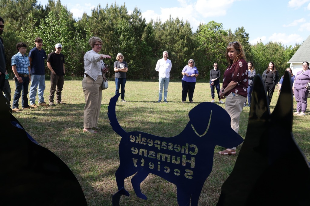 CCC students deliver benches to the Chesapeake Humane Society and everyone gathers to celebrate