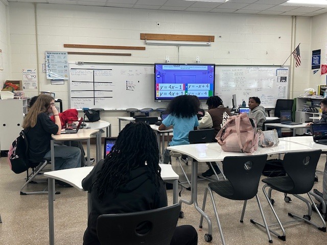 A group of students participating in an SOL review session