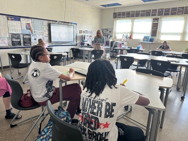 A group of students participating in an SOL review session
