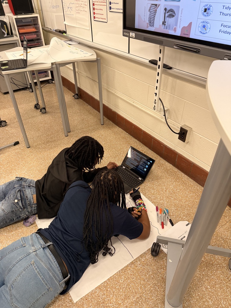 6th grade students working on a civics project. 