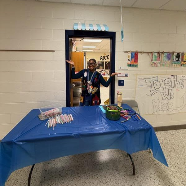 Ms. Pierce at our Together we RISE table.