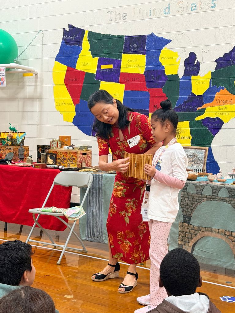 students exploring artifacts from ancient China