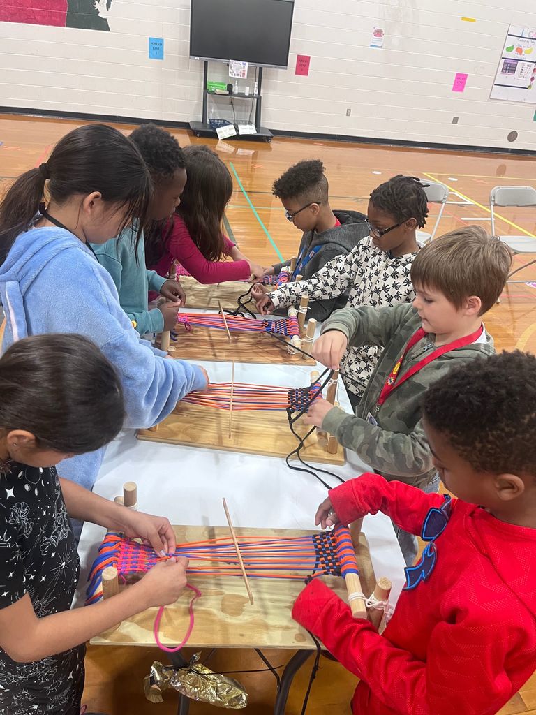 students exploring artifacts from ancient China