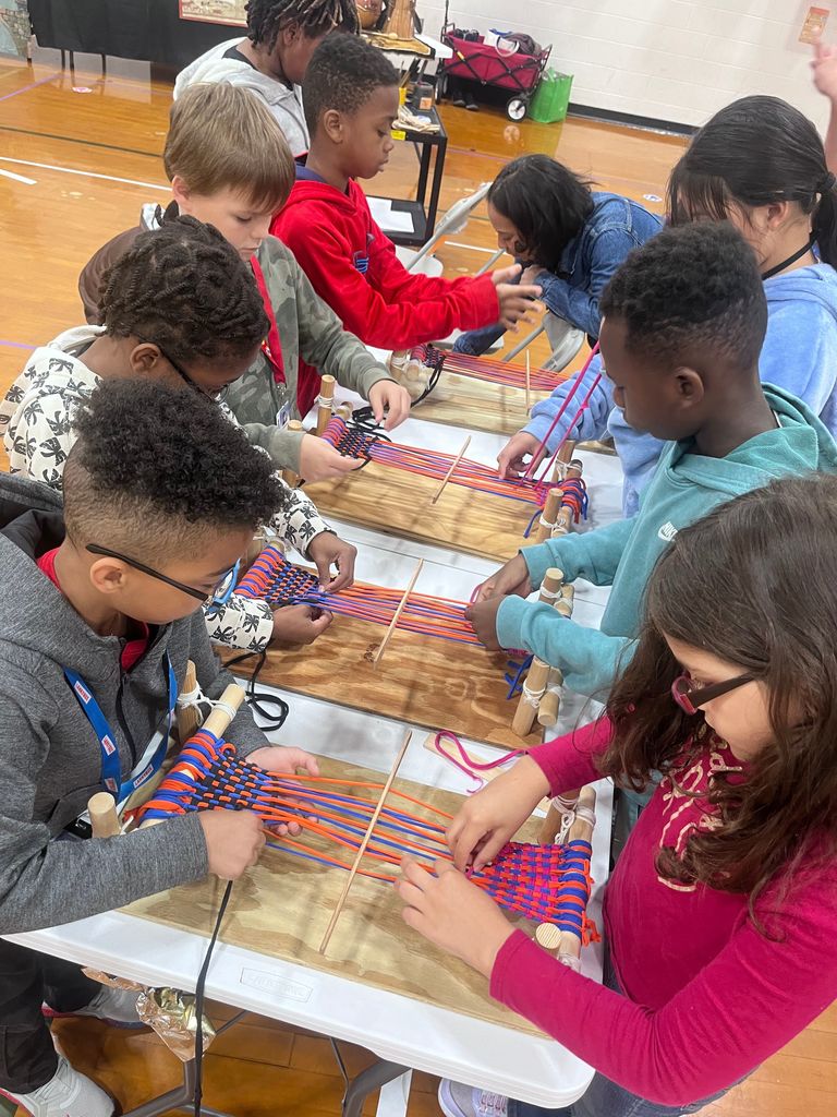 students exploring artifacts from ancient China