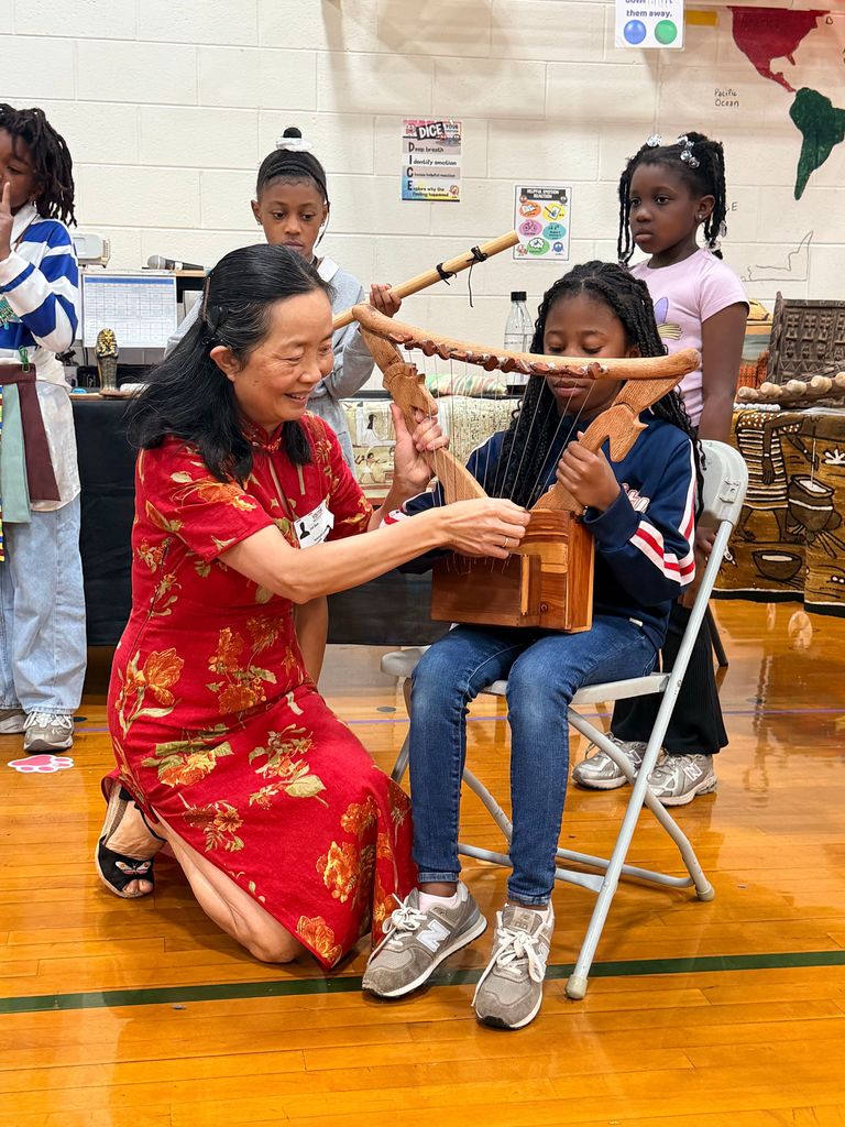 students exploring artifacts from ancient China