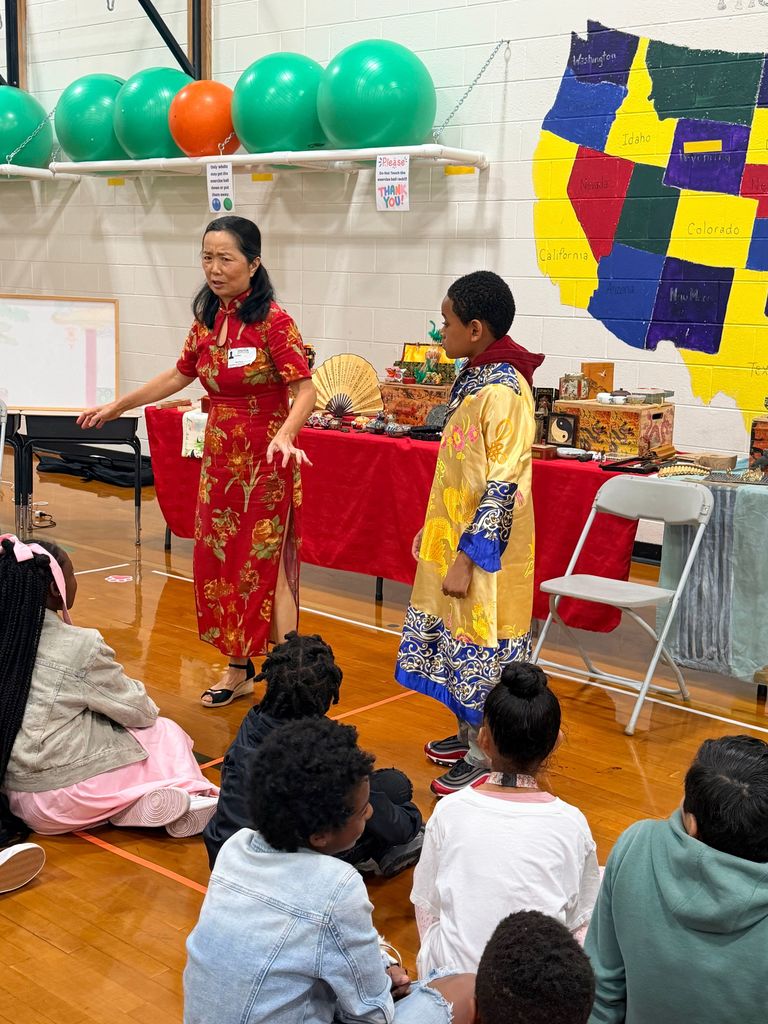 students exploring artifacts from ancient China