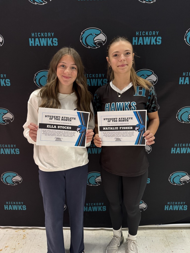 student-athletes of the month proudly holding their certificates