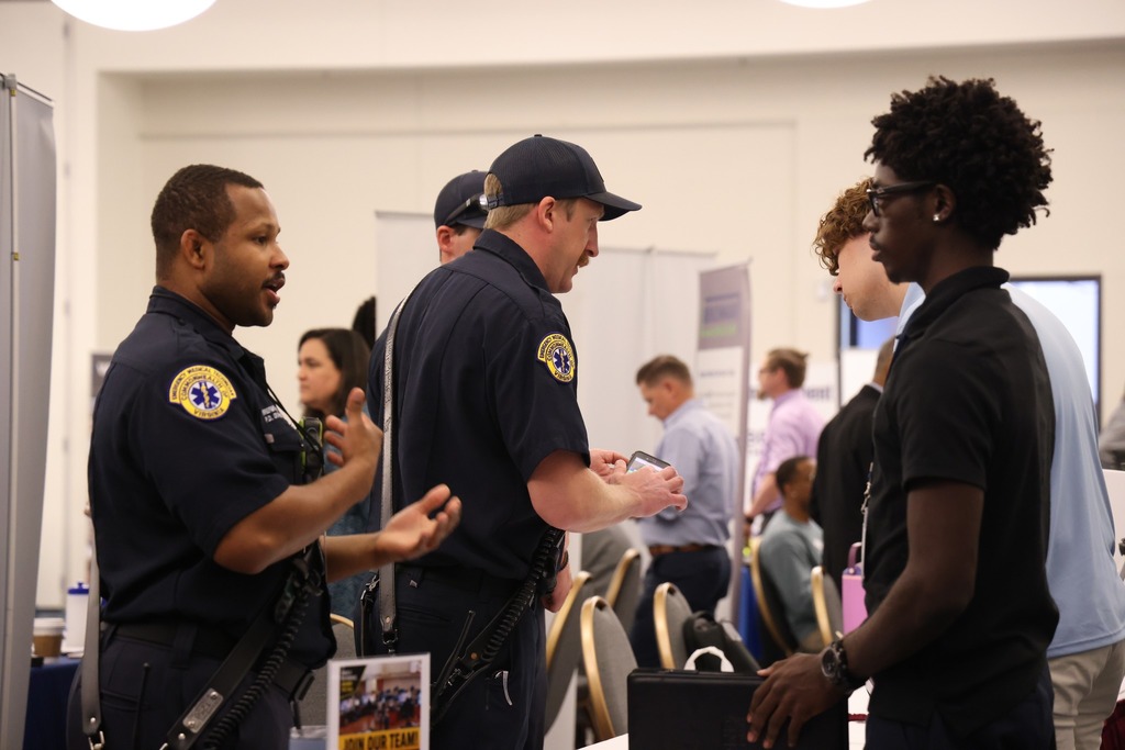 Students gather at the Beyond the Diploma event to ask questions of employers