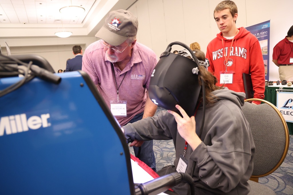 Students gather at the Beyond the Diploma event to ask questions of employers