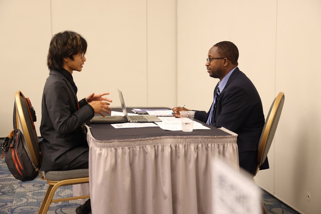 Students gather at the Beyond the Diploma event to ask questions of employers