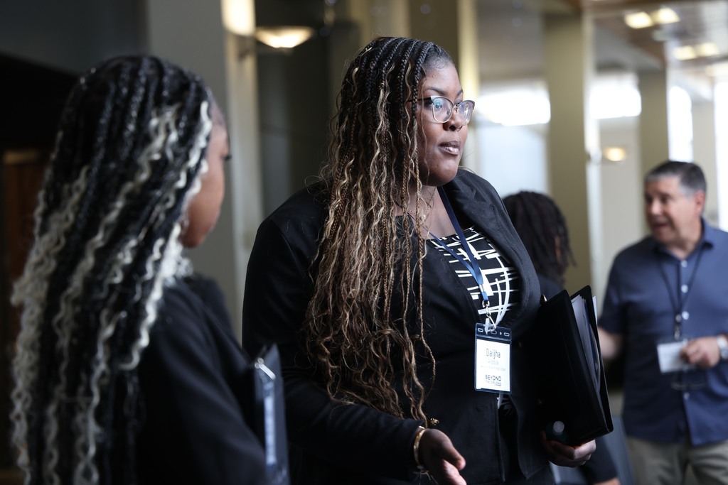 Students gather at the Beyond the Diploma event to ask questions of employers