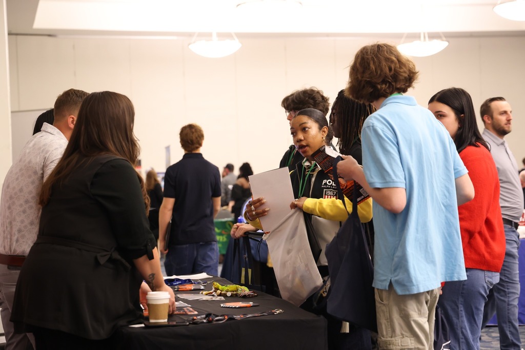 Students gather at the Beyond the Diploma event to ask questions of employers
