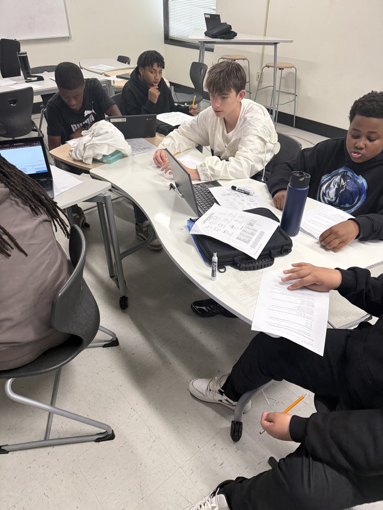 middle school students working together to review math skills