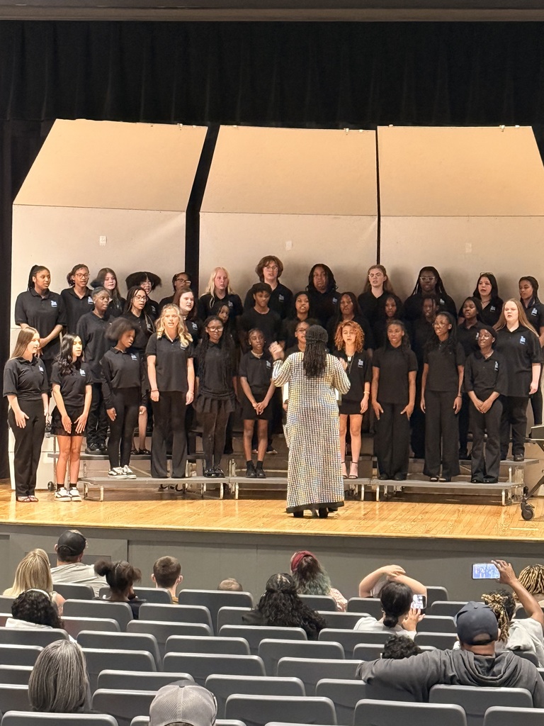 middle school students performing in a chorus concert