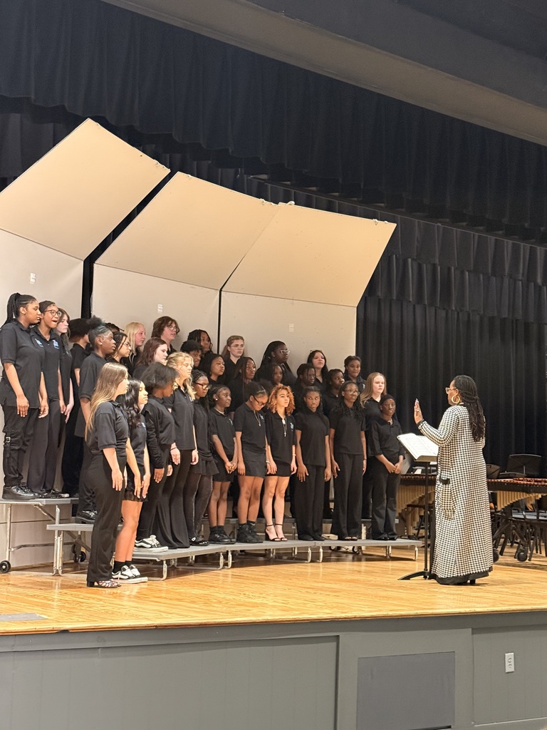 middle school students performing in a chorus concert
