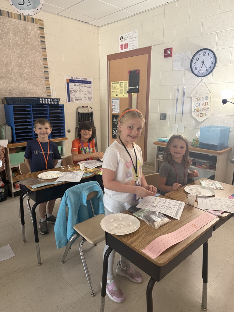 Mrs. Charlton's Class creating plane and solid figures with toothpicks and marshmallows. So much fun!  