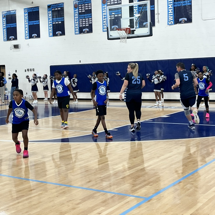 Action shot on the basketball court during the game. 