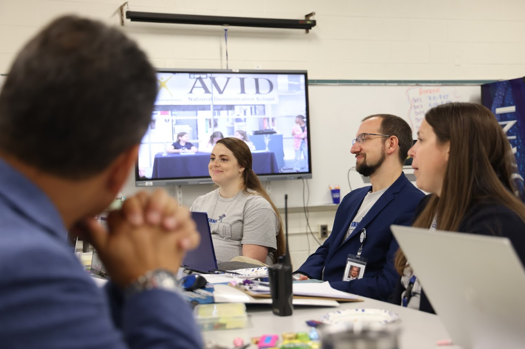 middle school staff and administrators sitting in a panel for AVID revalidation day