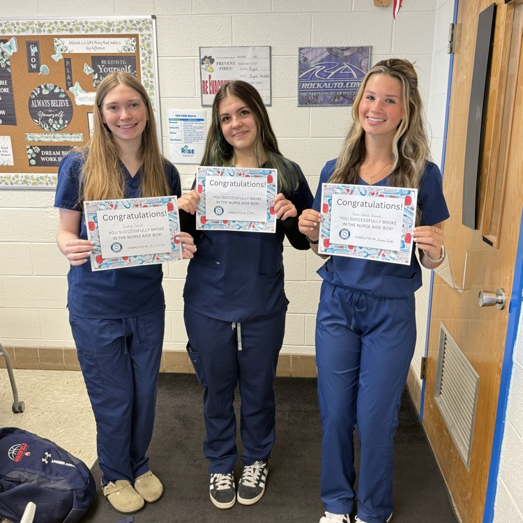 students with their certificates for completing the activity
