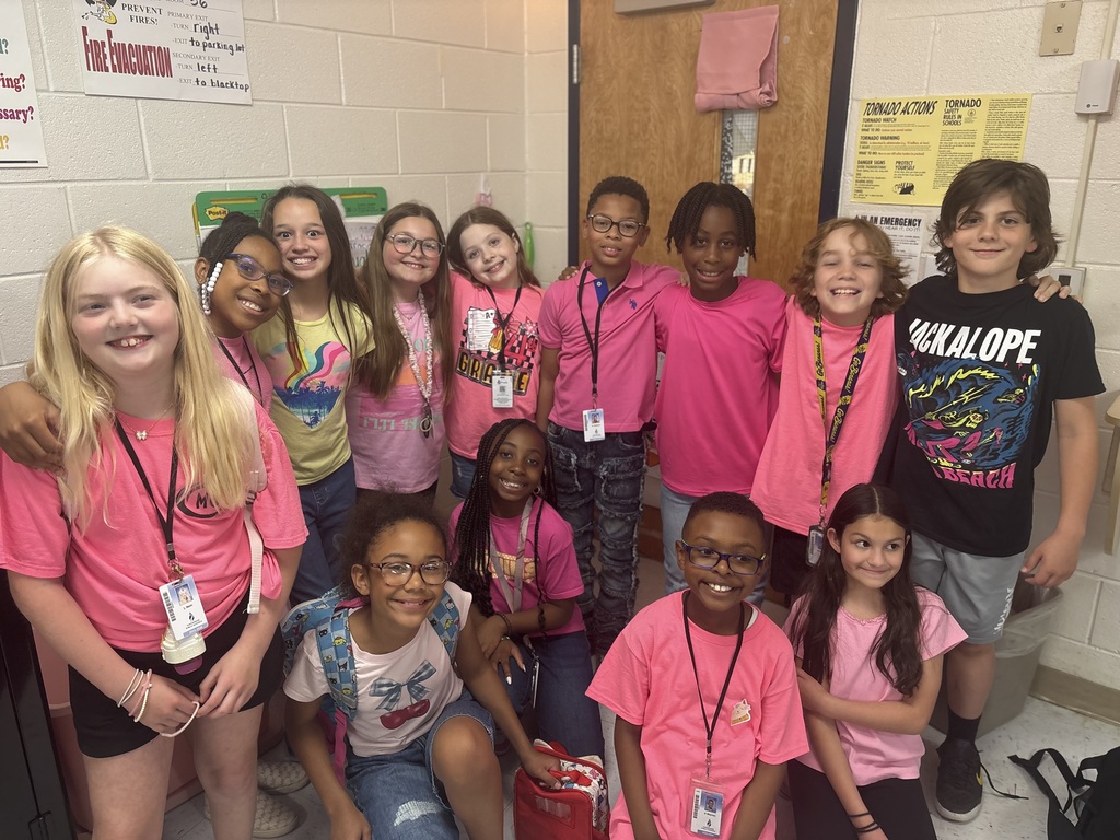 Class wearing Neon Pink shirts