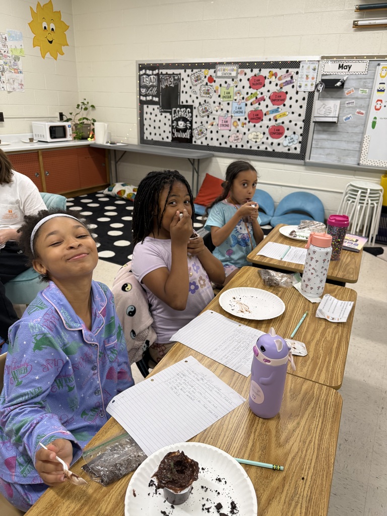 Students at desks with treat