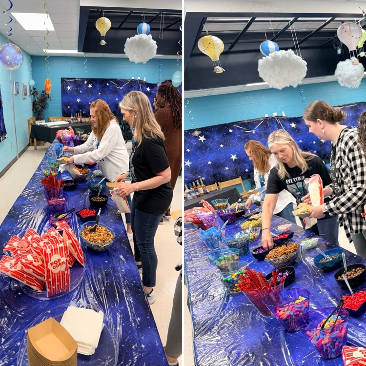 teachers enjoying the candy and popcorn bar