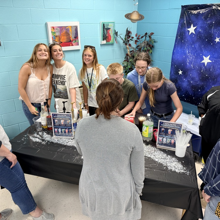 student leaders serving up sodas to our teachers