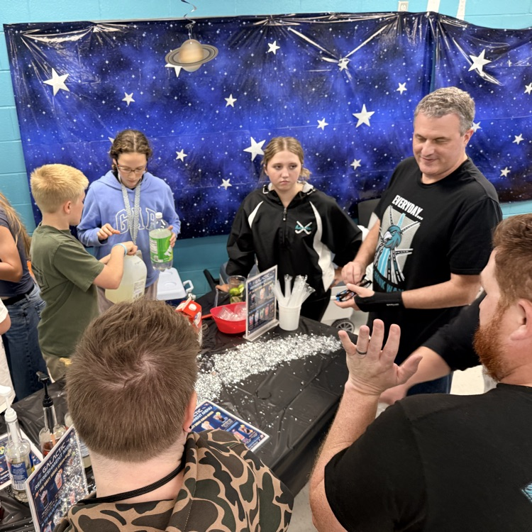 student leaders serving sodas to our teachers