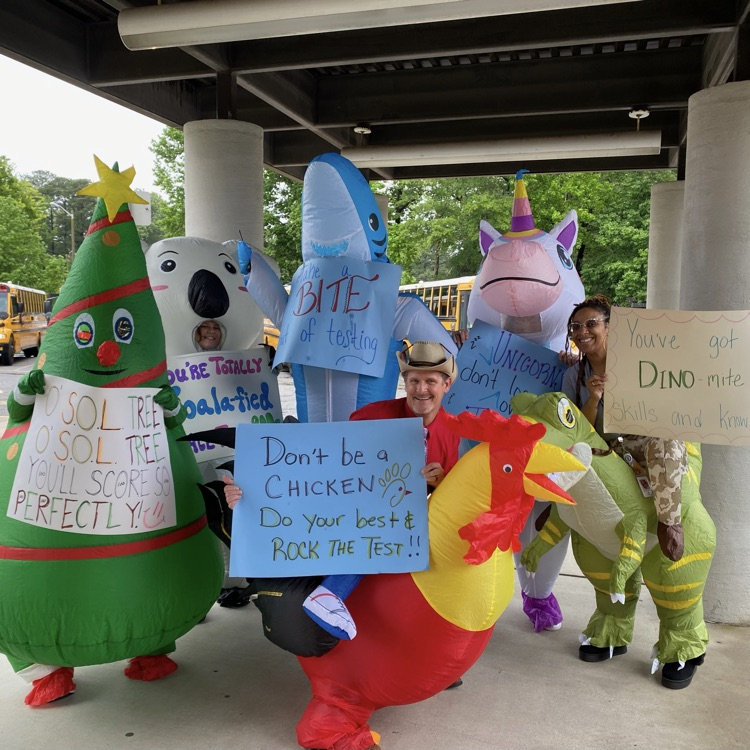 all of the staff in blow up costumes and SOL signs. 