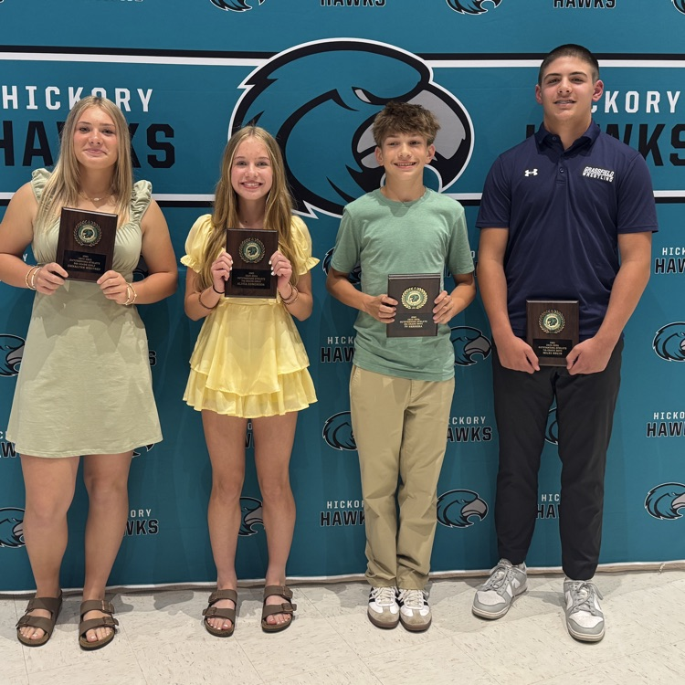 students posing with awards