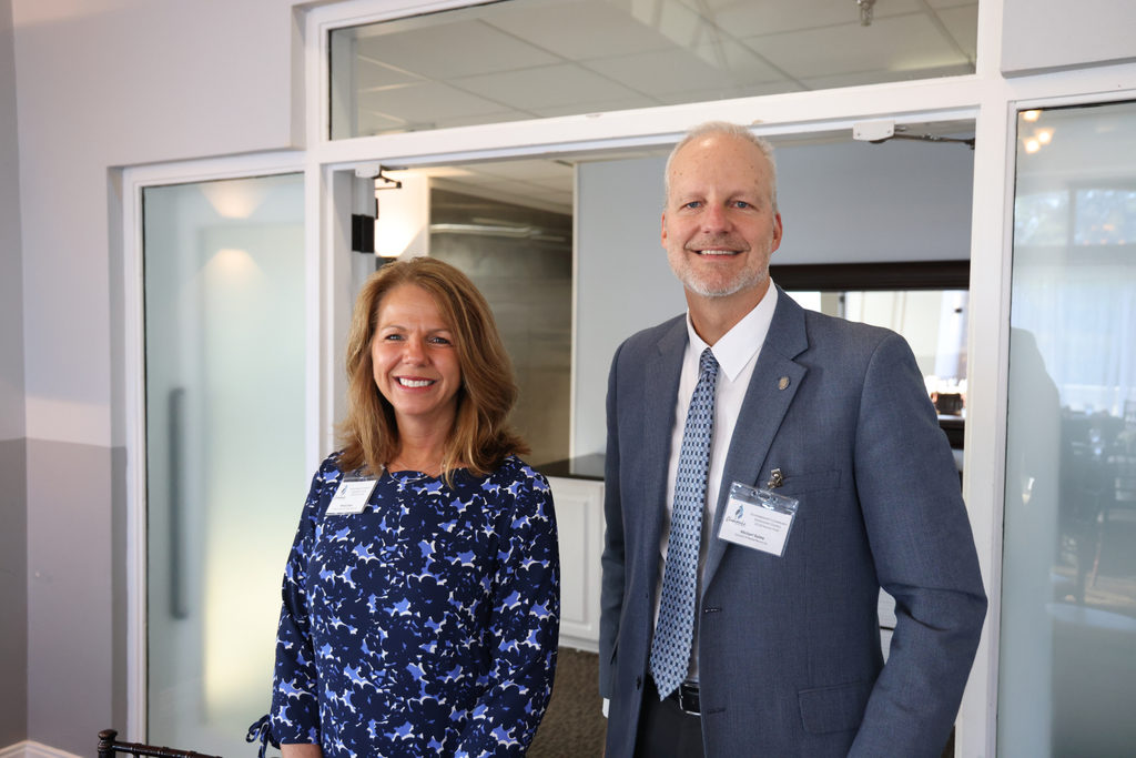 Mindy Green and Michael Bailey smiling.