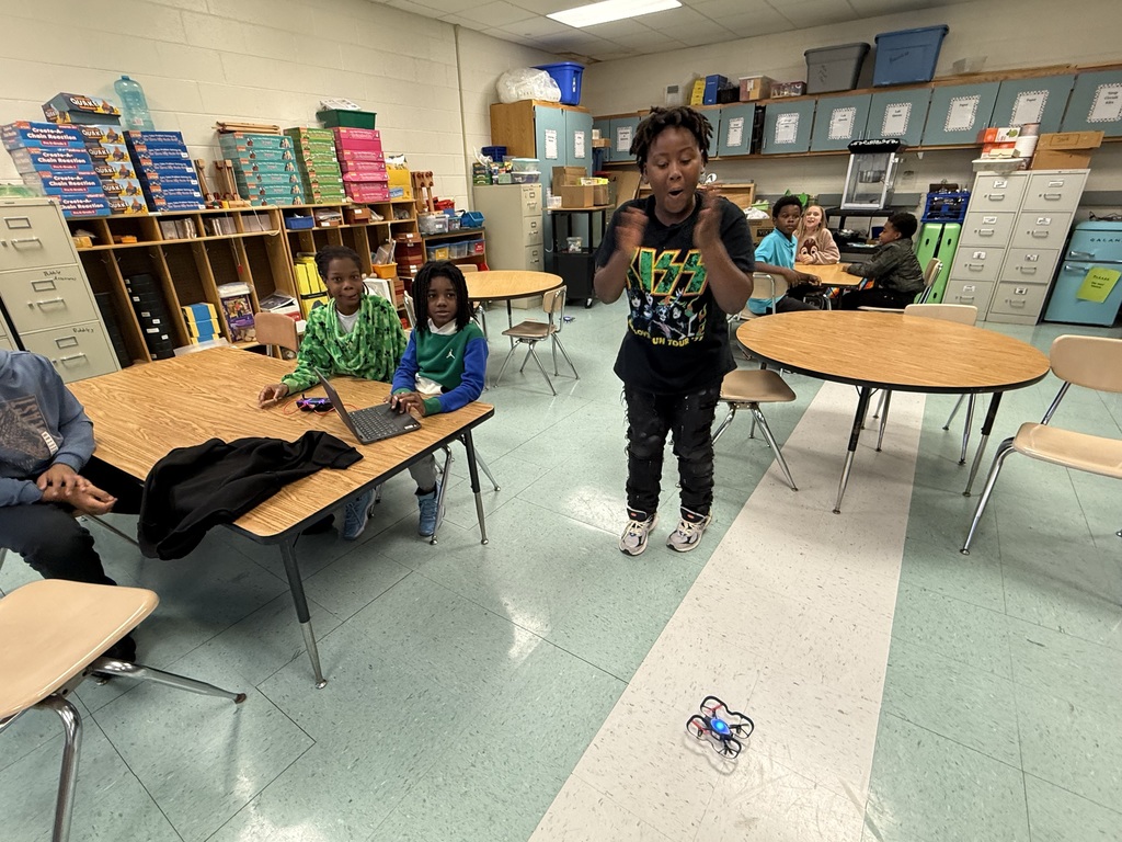 students coding drones