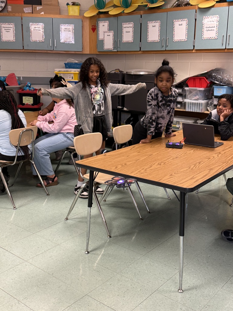 students coding drones