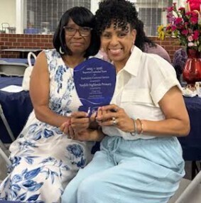 Mrs. LeDoux and Mrs. Wade at the banquet